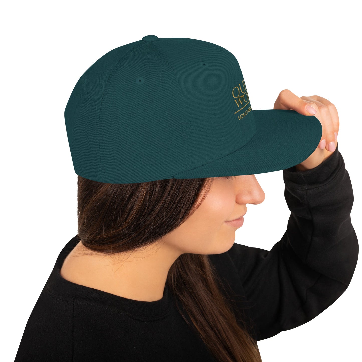 Dark green snapback cap with curved brim and right-side logo patch