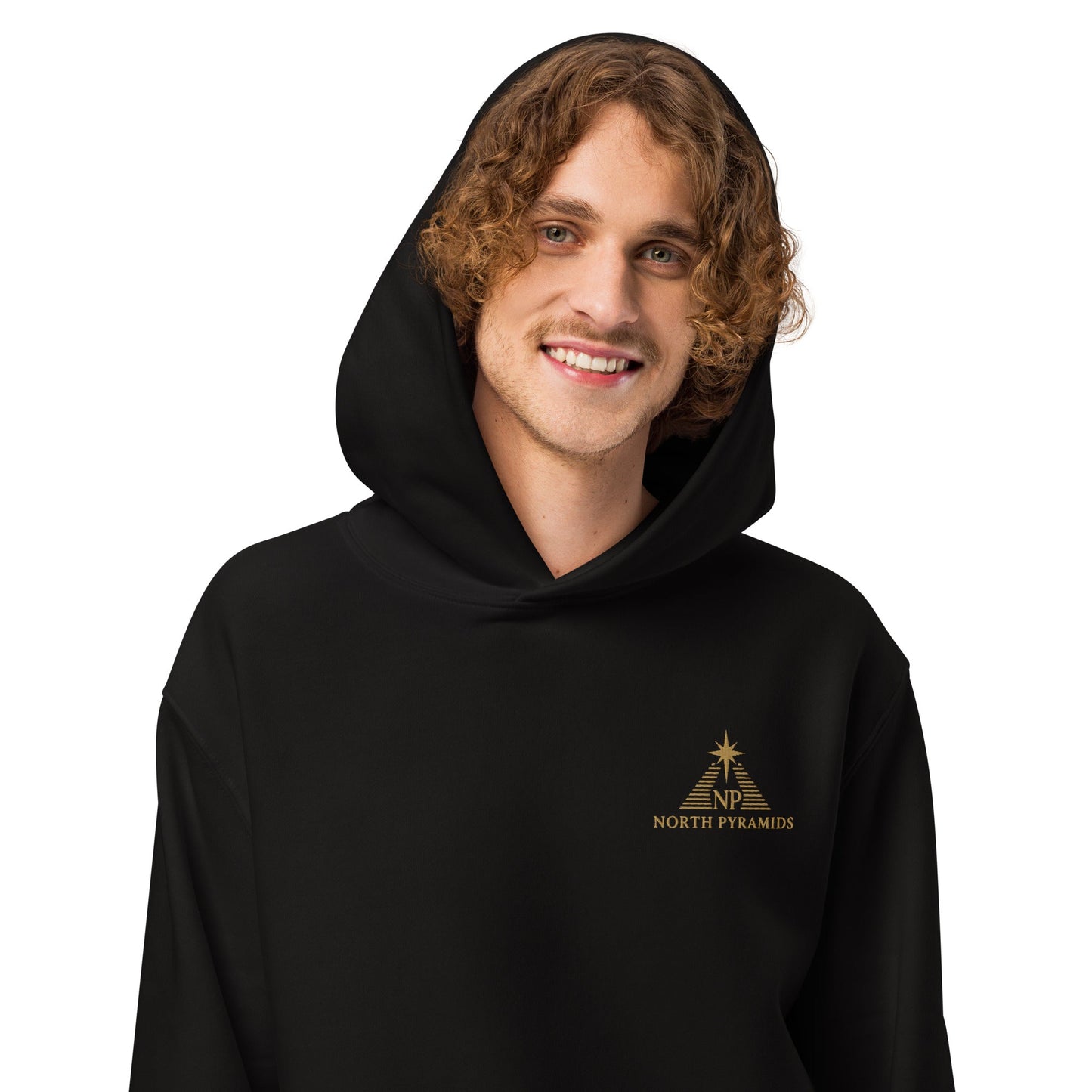 Black oversized hoodie with hood, front kangaroo pocket, and small North Pyramids logo.