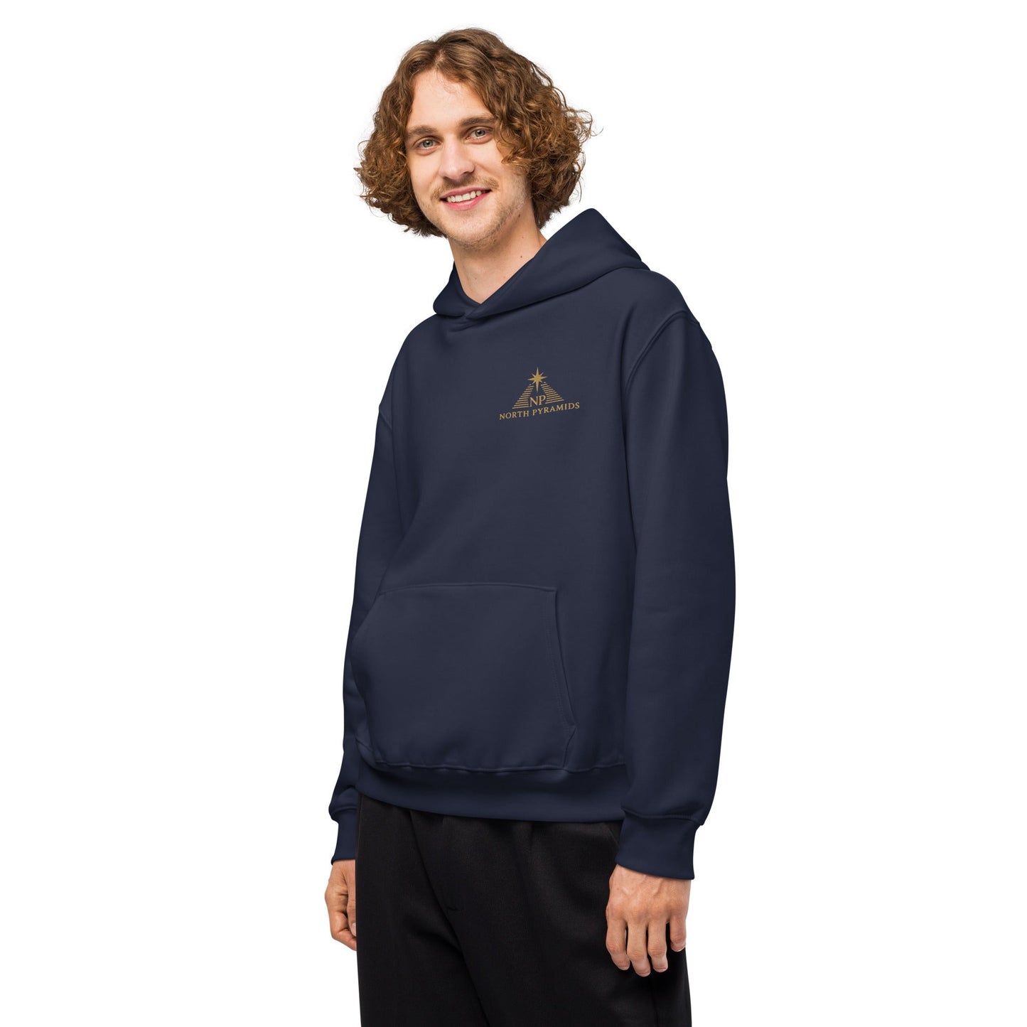 Navy oversized hoodie with hood and kangaroo pocket, side view with chest logo.