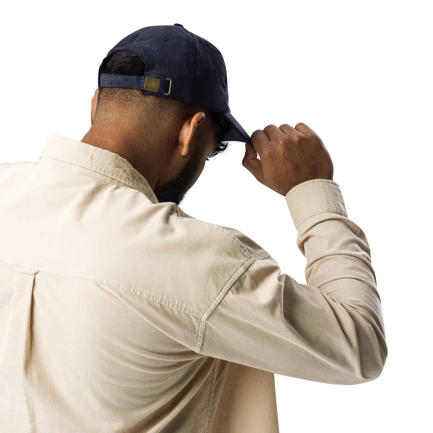 Navy corduroy cap with back strap and gold-tone buckle detail.