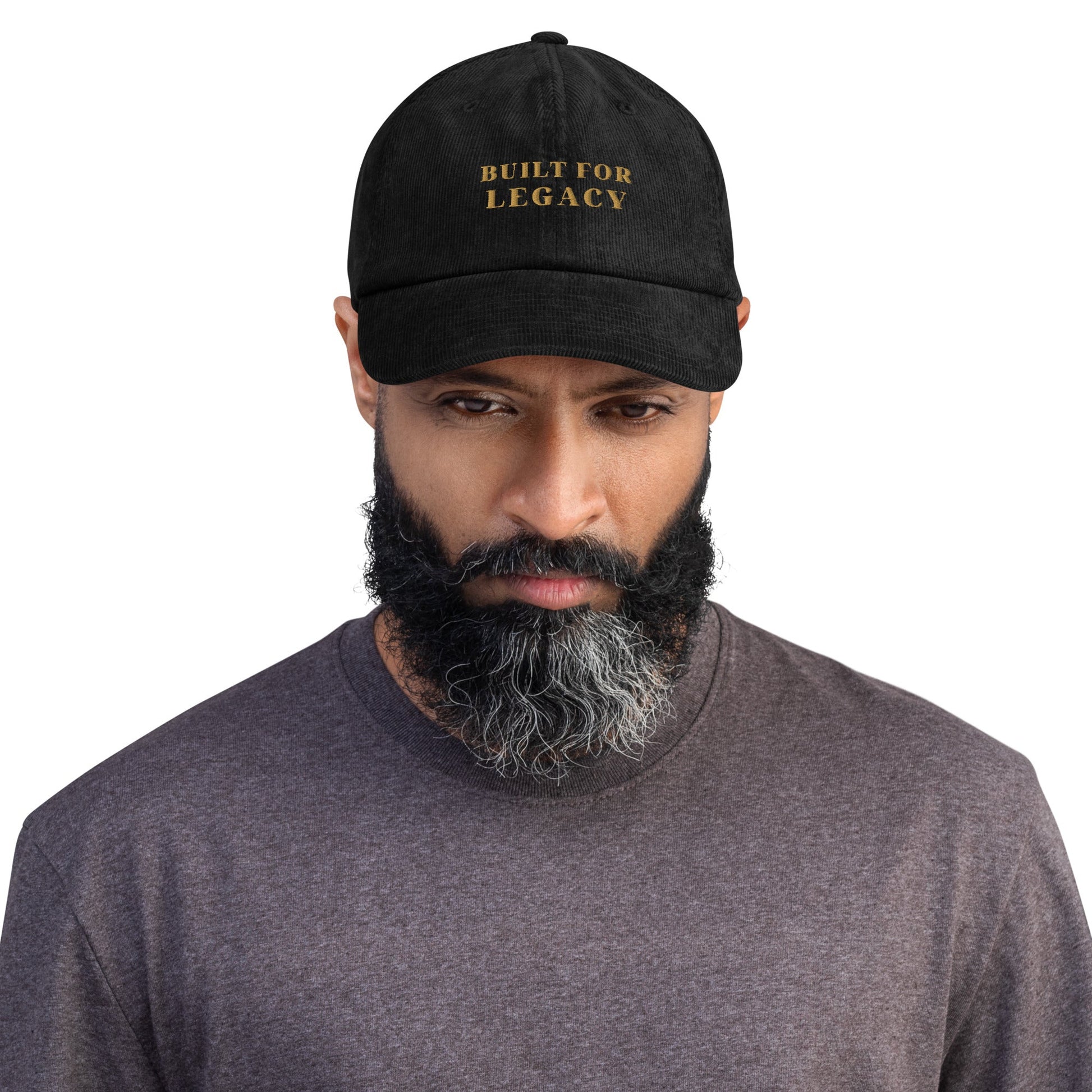 Black corduroy heritage hat with “BUILT FOR LEGACY” embroidered on the front