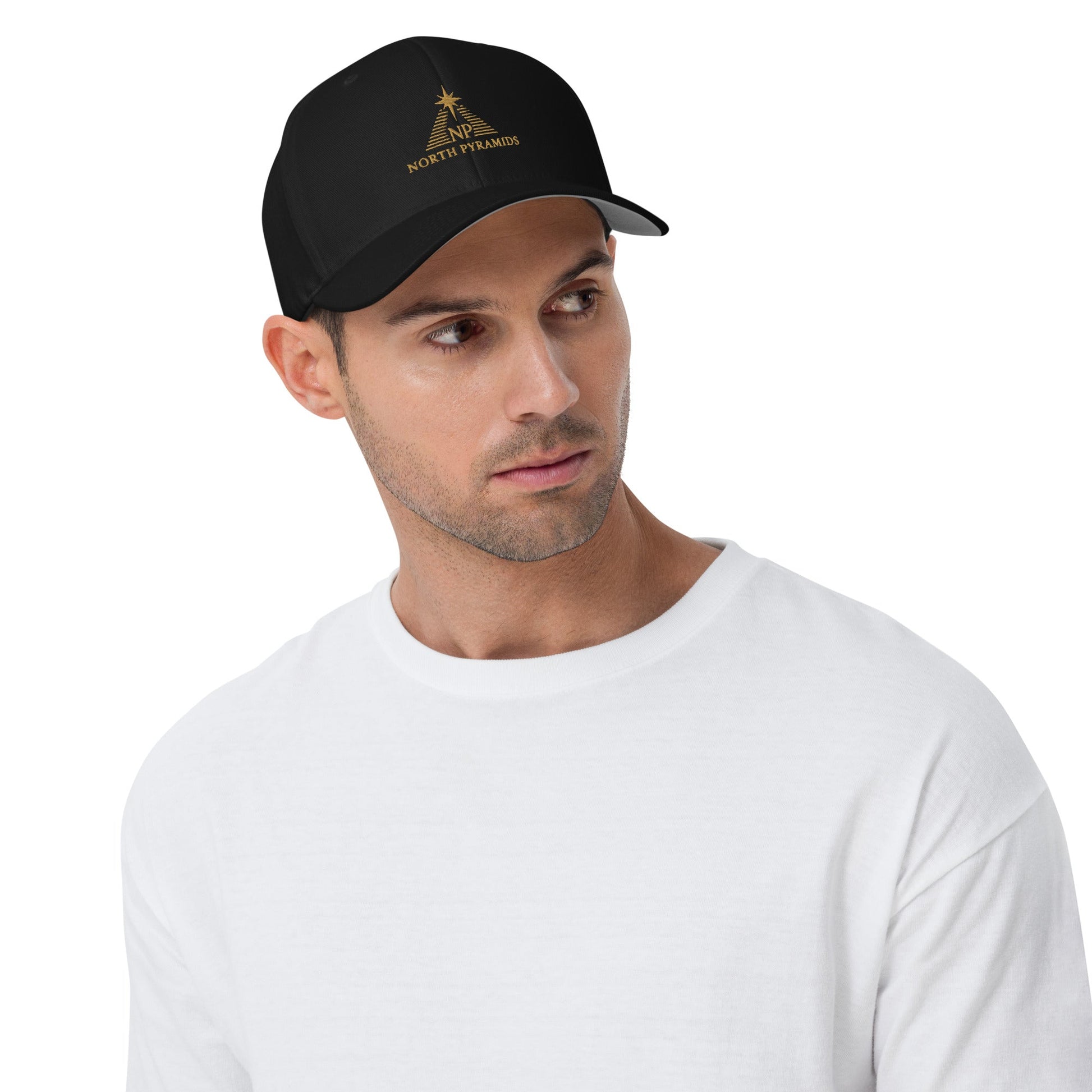 Black structured cap with gold embroidered logo on front and curved brim