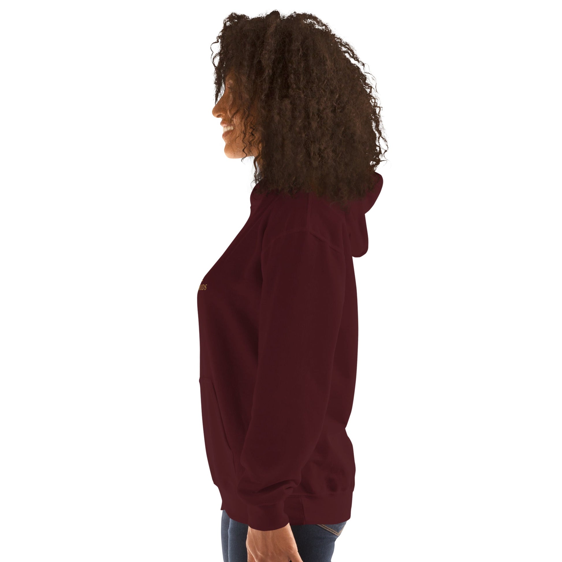Unisex heavy blend hoodie in maroon with hood and kangaroo pocket, side view