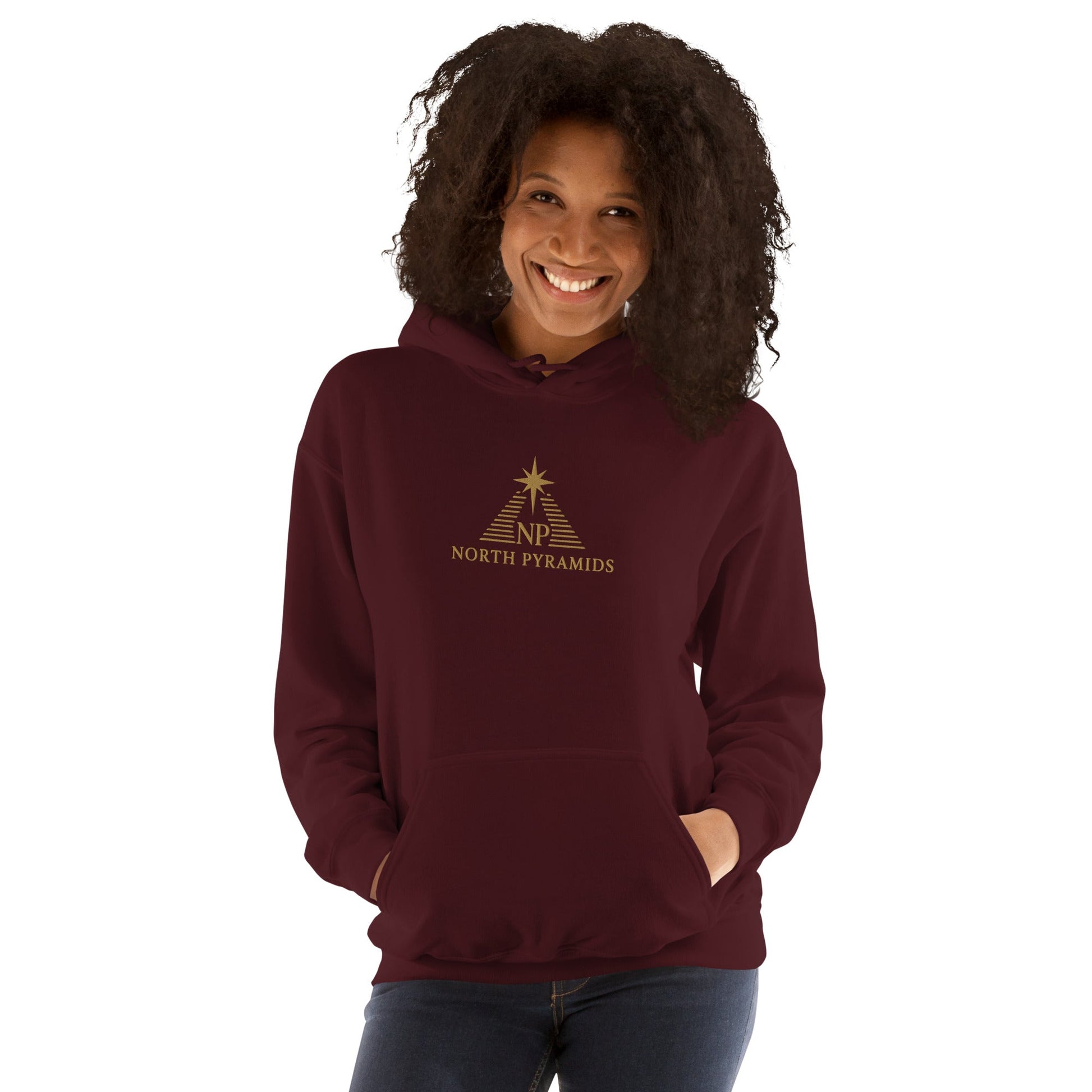 Unisex heavy blend hoodie in maroon with front hood, drawstring, and North Pyramids logo