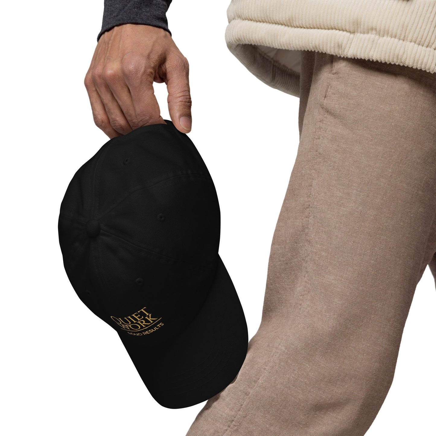 Black dad hat with curved brim and embroidered logo patch