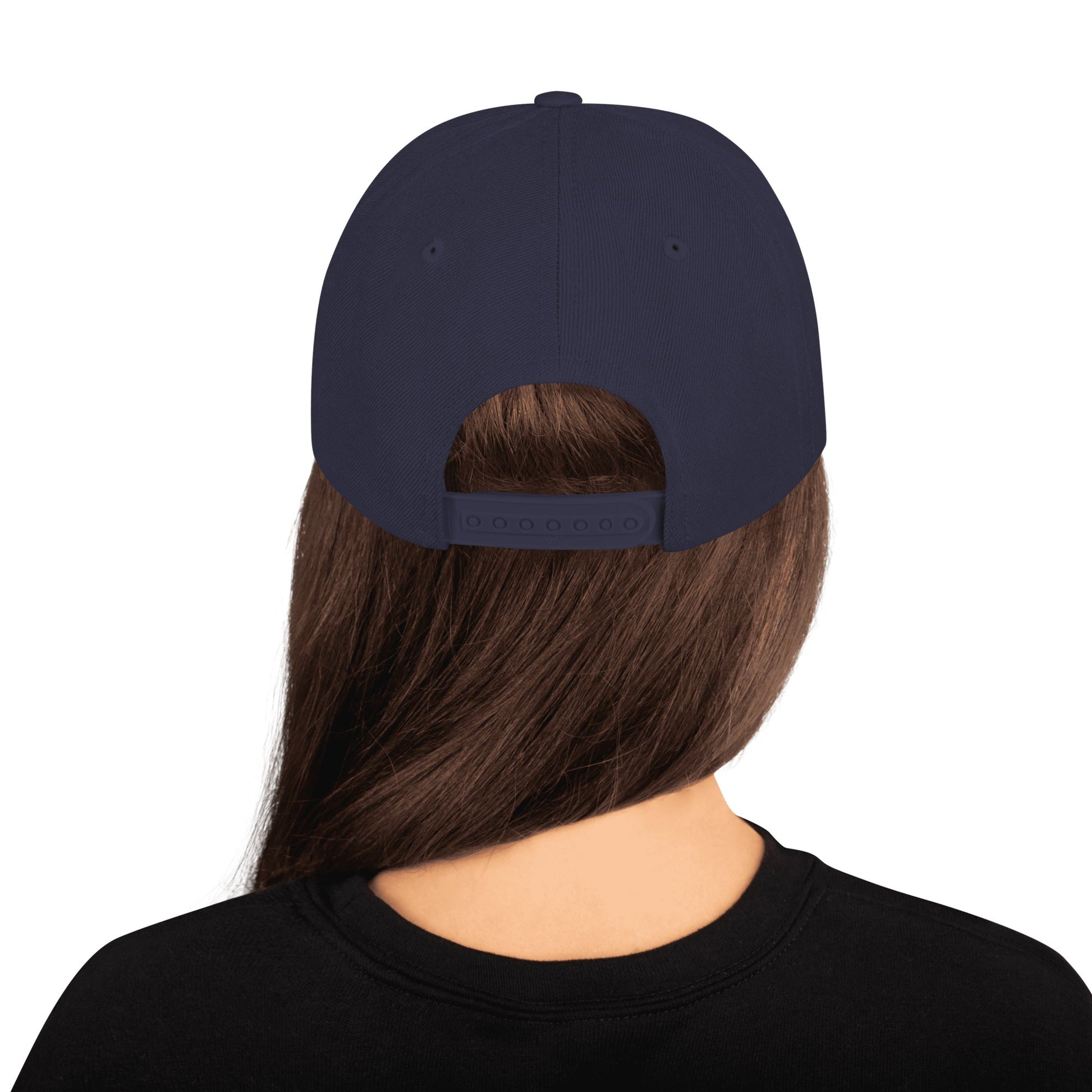 Dark navy snapback cap back view with adjustable strap
