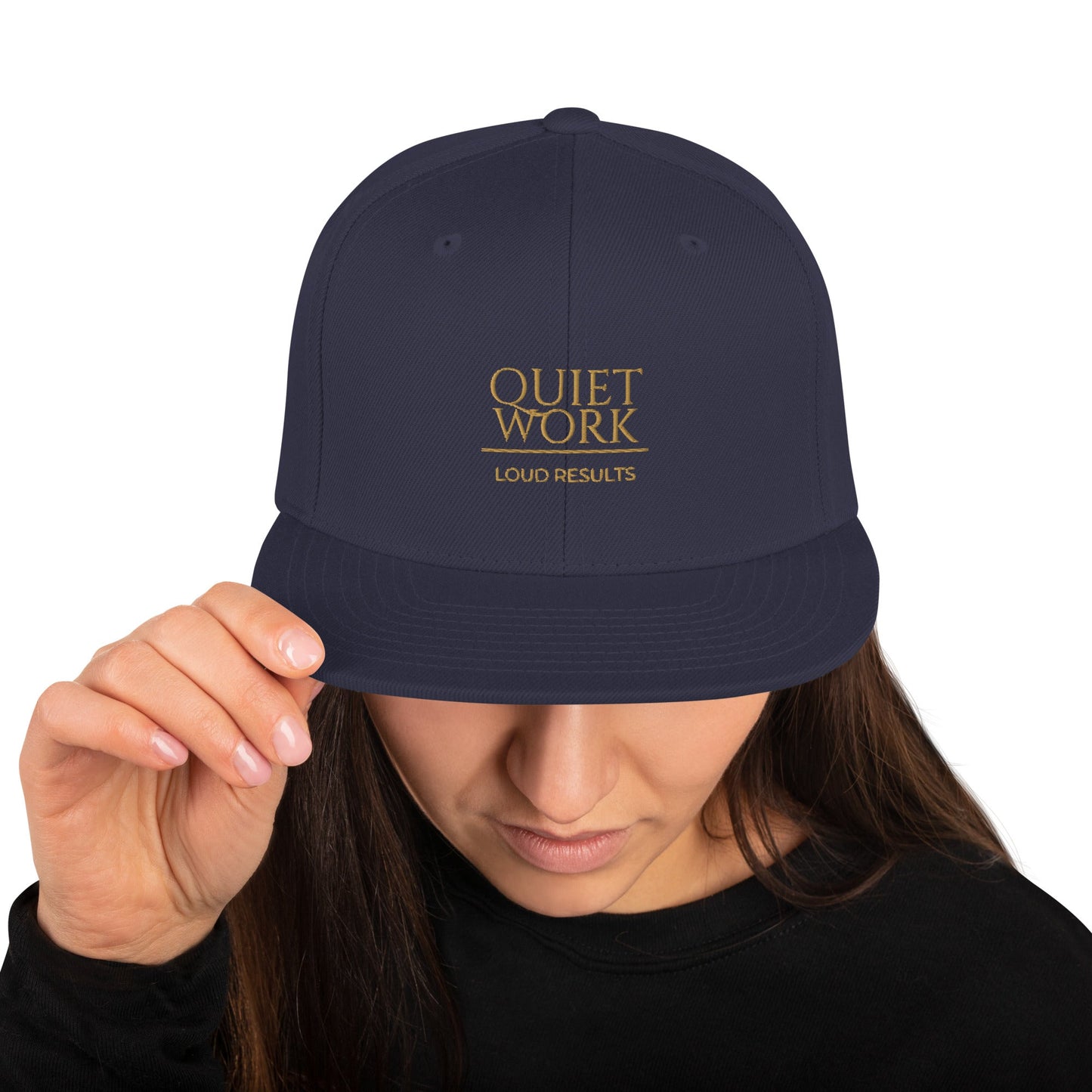 Dark navy snapback cap front view, "QUIET WORK" logo centered