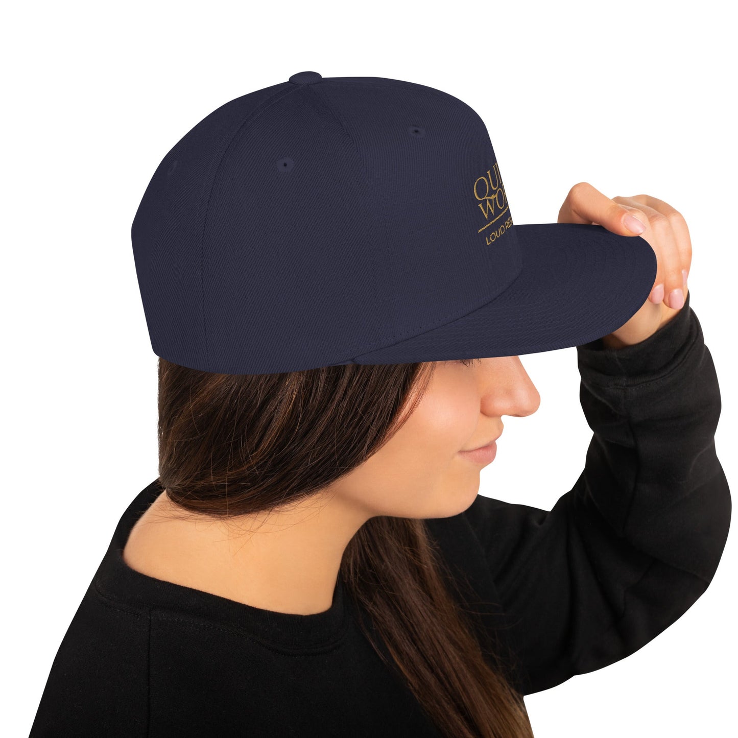 Navy snapback cap with curved brim and right-side logo patch